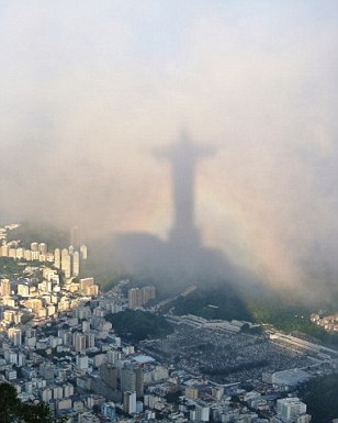 This unusual snap of Christ the Redeemer in Rio de Janeiro was entered into the Urban category. Photographer Ben Goodwin said: 'It was the end of a long day of sightseeing and I had reached the top of Corcovado, only to be greeted by thick cloud as far as the eye could see.  Suddenly, the clouds parted to reveal Rio de Janeiro in all its glory and I quickly set up my camera. As light flooded across the city, I noticed the shadow of Christ the Redeemer fill my frame and quickly took a series of shots, as a rainbow briefly gave the statue its own halo'