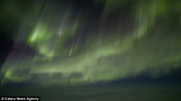 The part-time photographer had dreamt about filming the Northern Lights from an aeroplane