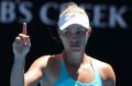 MELBOURNE, AUSTRALIA - JANUARY 18: Angelique Kerber of Germany challenges a line call in her second round match against ...