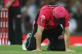 Brought to their knees: Colin Munro feels his side's pain.