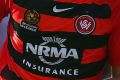 SYDNEY, AUSTRALIA - JANUARY 22: Lachlan Scott of the Wanderers celebrates scoring a goal during the round 16 A-League ...