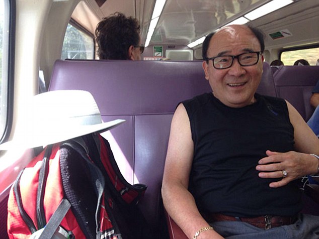 This man travelling on a train in Korea shares the same hair and smile as the American director