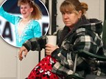 Puffing away: Tonya Harding, 46, was spotted smoking a cigarette outside her home in Washington on Wednesday morning