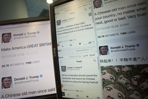 Computer screens display the fake tweets that online users can self generate at a Chinese website in Beijing, China, Thursday, Jan. 26, 2017.