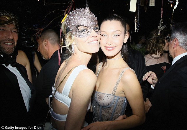 Dazzling: Bella and Eva Herzigova both glittered at the masquerade ball