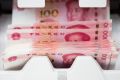 Banks and other financial institutions in China will have to report all domestic and overseas cash transactions larger ...