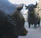 Two statues, depicting a Bear, left, and a Bull are seen standing outside the entrance to the Frankfurt Stock Exchange.