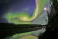 tra3-onedayx3whitehorse
RNPS IMAGES OF THE YEAR 2012 - Swirls of green and red appear in an aurora over Whitehorse, ...