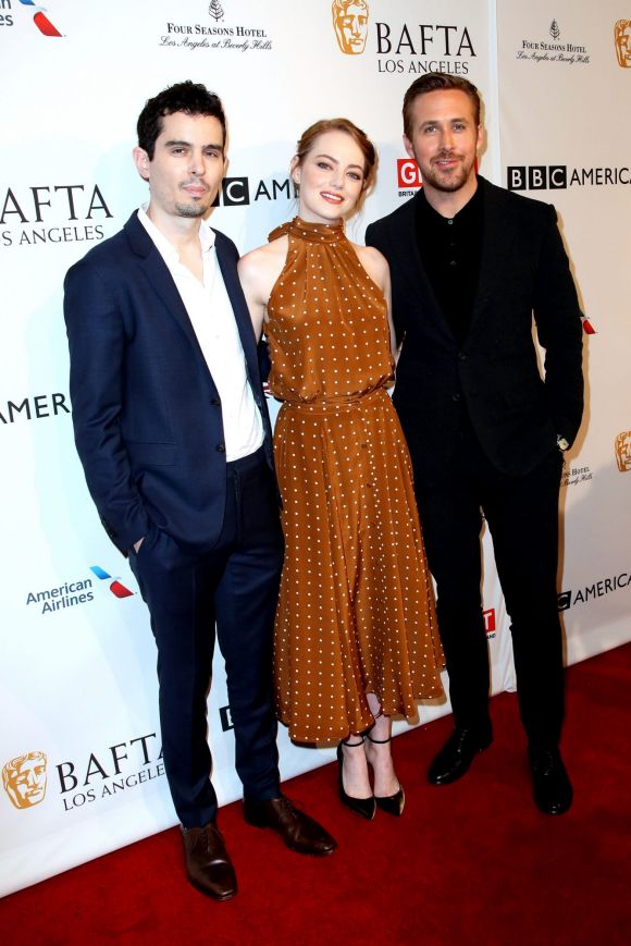 Damien Chazelle, Emma Stone, and Ryan Gosling attend The BAFTA Tea Party at Four Seasons Hotel Los Angeles at Beverly ...