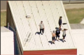 Youths on the roof of the Malmsbury Justice Centre.