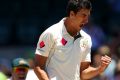 SYDNEY, AUSTRALIA - JANUARY 07: Mitchell Starc of Australia celebrates dismissing Asad Shafiq of Pakistan during day ...