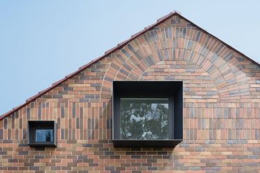 Heritage touches: Herringbone brickwork gables can be seen from the nearby streets.