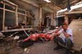 Locals inspect damage in parts of the historic district of  Diyarbakir last May.