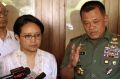 Indonesian Armed Forces Chief General Gatot Nurmantyo, right, speaks to the media as Foreign Minister Retno Marsudi, ...