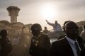 Barrow, waving, had been staying in Senegal after authoritarian ex-president Yahya Jammeh refused to step down following ...