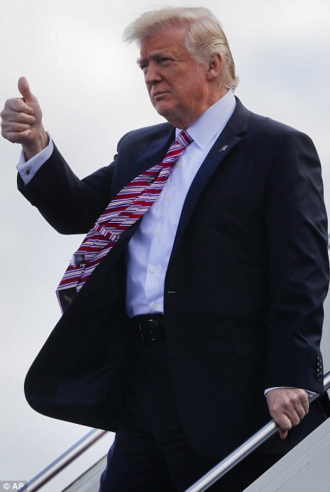 President Trump give a 'thumbs-up' upon his arrival on Air Force One at Philadelphia International Airport