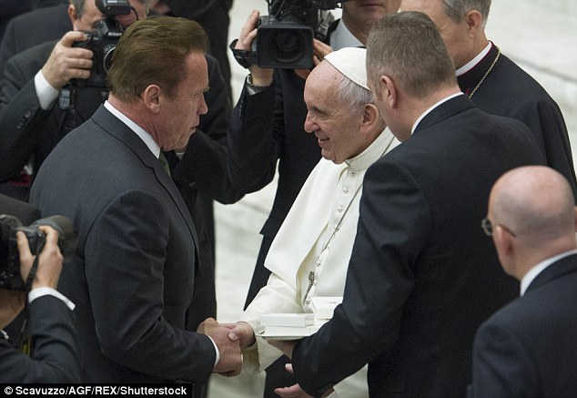 Humbled: The action movie legend, 69, attended the Catholic leader's weekly sermon in Vatican City on Wednesday