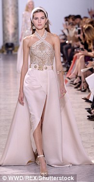 Main show: The Elie Saab runway show was a glamorous fusion of glittering fairy-tale inspired ballgowns and slinky dresses of light, feminine hues