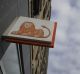 The ING Groep NV lion logo sits on a sign outside a bank branch in Amsterdam, Netherlands.