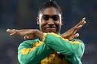 Caster Semenya brushes  the dust off her shoulders after the race.