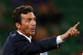 Banished: Guillermo Amor coach of Adelaide remonstrates with the fourth official.
