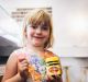 Zoe Doerr, of Watson, loved the Vegemite ice cream but her mum US-born Veronica, who earlier in the day became an ...