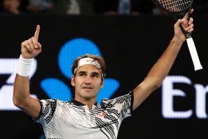 Switzerland's Roger Federer celebrates after defeating compatriot Stan Wawrinka in their semi-final.