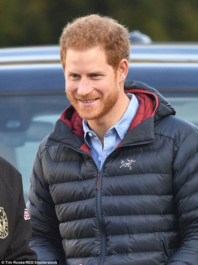 Harry visiting a Help for Heroes centre in Hampshire this week. He is though to have whisked his girlfriend away for a trip to Tromso, on the Norwegian fjords, for the New Year