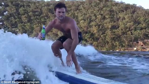 Can they fine me for this? Scott Eastwood posts video of him surfing with a beer in hand while celebrating Australia Day