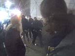 NYPD officers can be seen leading Shia LaBeouf away in handcuffs during the protest