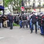 CGT stewards alongside French riot police.