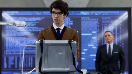 Ben Whishaw stars as Q and Daniel Craig stars as James Bond.