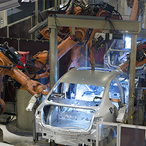 Welding robots work on vehicles at the Volkswagen AG assembly plant in Puebla, Mexico, on Thursday, Jan. 23, 2014. (Susana Gonzalez/Bloomberg via Getty Images)