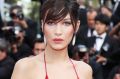 Bella Hadid attended "The Unknown Girl (La Fille Inconnue)" film premiere at Cannes wearing...not much.