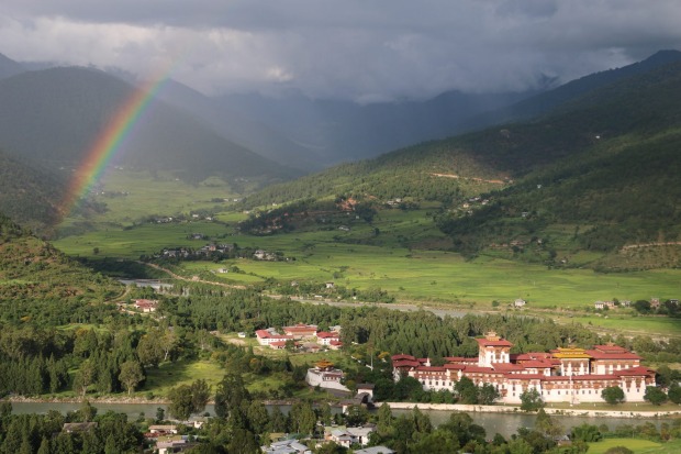 Punakha Dzong: Watching from our room at the Zhingkham Hotel, the afternoon rained rolled in across Punakha Valley, ...