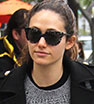 Low key: Emmy Rossum sported a casual grey knit sweater, black pea coat and blue jeans as she stepped out for coffee on a cold and rainy day in Los Angeles