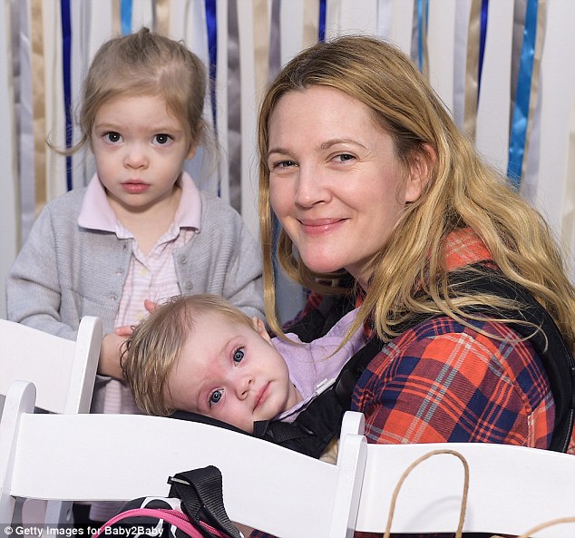 Doting mom: Drew is pictured with her daughters Olive and Frankie in 2014 