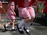 Children at St. George's C of E Primary School in Stockport, skip and play hop scotch during playtime