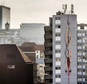 A mural of a gutted body hanging upside down with blood seeping out, is painted on an apartment building in Brussels on Thursday, Jan. 26, 2017. Depicting details from Caravaggio and Dutch Master paintings, an anonymous street artist is the talk of the town and again asks that age-old question about art: how far can it go before it outrages just too much. (AP Photo/Geert Vanden Wijngaert)