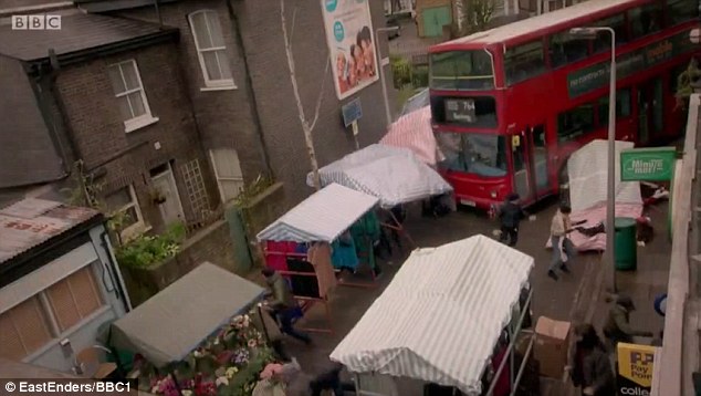 Wrecking machine: The bus crashed through Walford's market place, sending characters jumping for safety