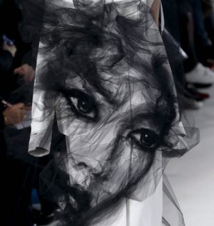 It's certainly unique: A tulle face design on the front makes it appear as if a ghost is coming off the fabric