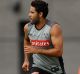 Up and running: New Magpie Daniel Wells in a training session at Olympic Park Oval.