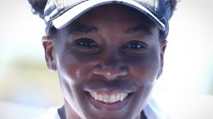 Still smiling: Venus Williams after a training session on Friday. 