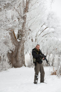 A Patriot movement member stands guard during the Malheur Wildlife Refuge Occupation in Oregon in January. Photo: Shawn Records.