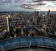 Skyscrapers stand in the financial district as commercial and residential property is seen on the city skyline in the ...