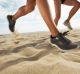 istockphoto Cropped shot of the legs of two athletes running on a beach action; active lifestyle; adult; athlete; beach; ...