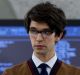 Ben Whishaw stars as Q and Daniel Craig stars as James Bond.