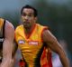 Richmond's Daniel Jackson is pursued by All Star Eddie Betts in 2013.