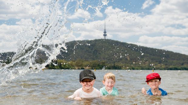 Fyn 4, Marlow, 3, and Noah Butler, 6, beating the heat in Lake Burley Griffin before the school holidays end.