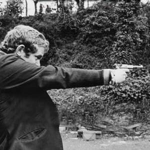 Martin McGuinness: From IRA chief to statesman - Taken in 1972, aiming a pistol.